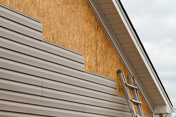 Professional Siding technician working in Hughesville, PA